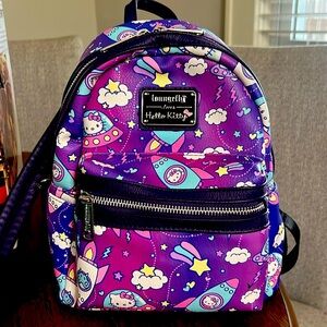 Hello Kitty Lounge Fly backpack. Purple, great condition!
